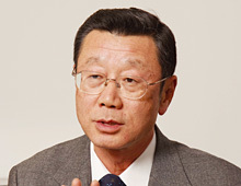 津田 芳明